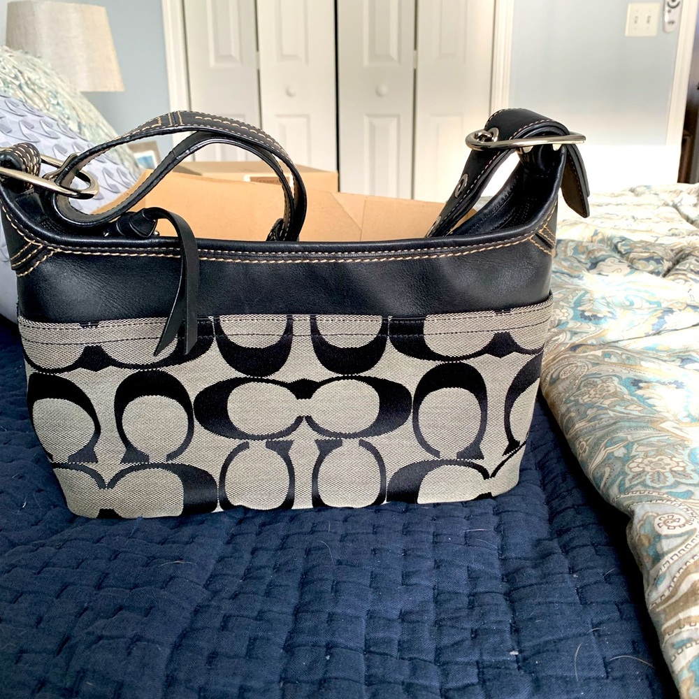 Coach handbag.  Never been used.  In original box